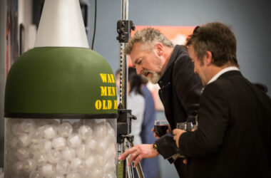 Men looking at Peace Machine Number 2 at Passion for Freedom 2015 launch