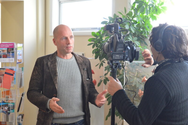 Jamie McCartney gives an interview to William Ranieri at Latest TV at the Brighton SHAC sexual health clinic